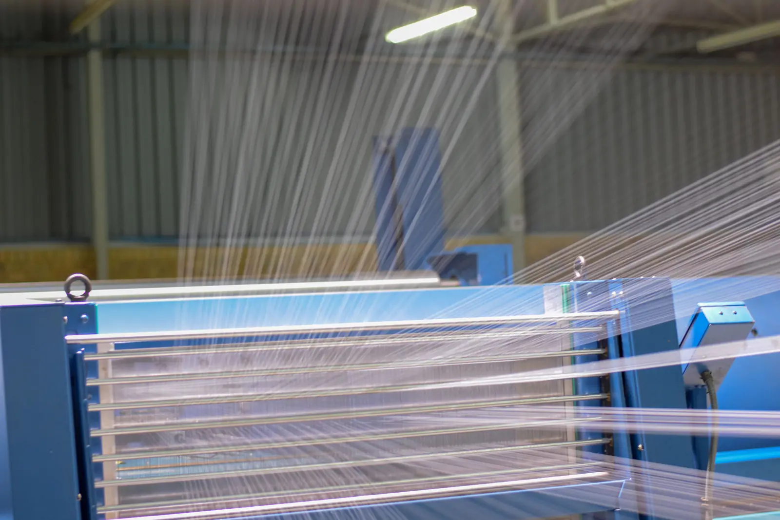 Warping — yarn being prepared onto the warp beam